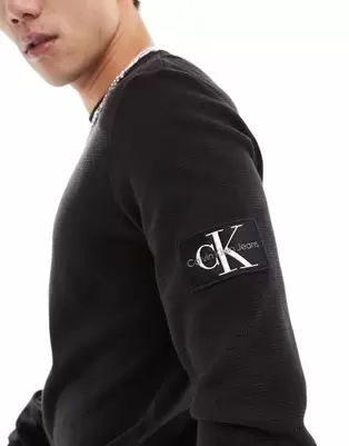 Calvin Klein Jeans - Sort langærmet vaflet T-shirt på tilbud til 420 kr. hos Asos